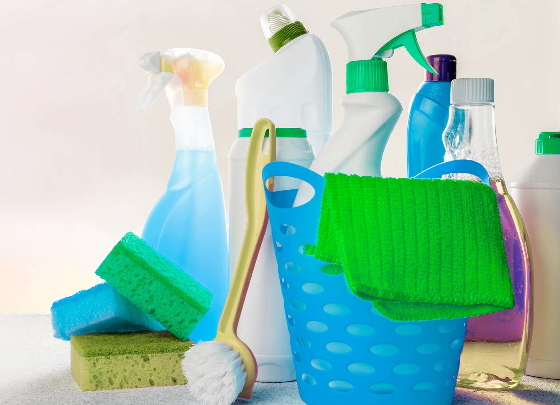 Various cleaning bottles and sponges