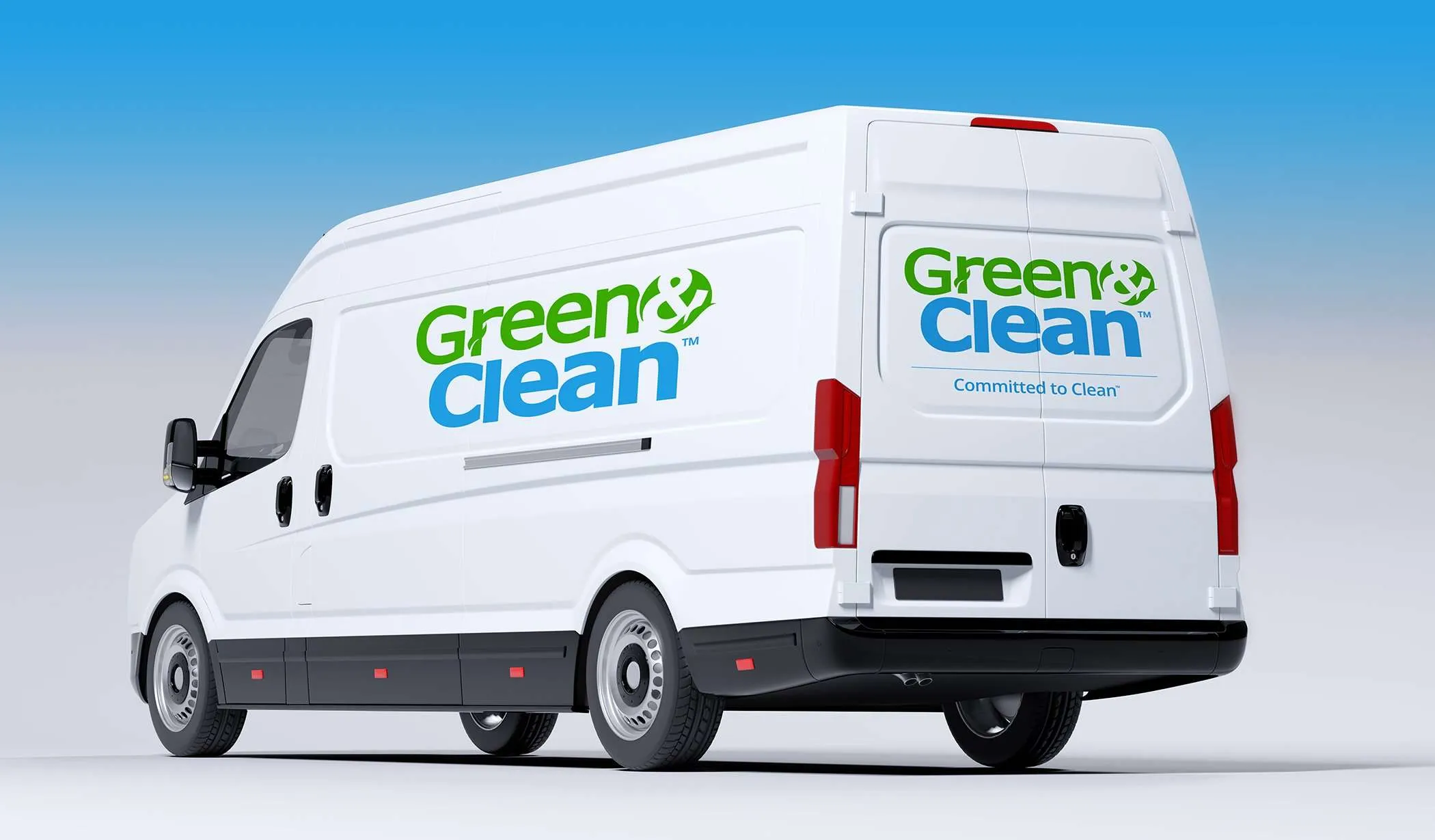 A cleaning van with the Green & Clean logo on the side and back